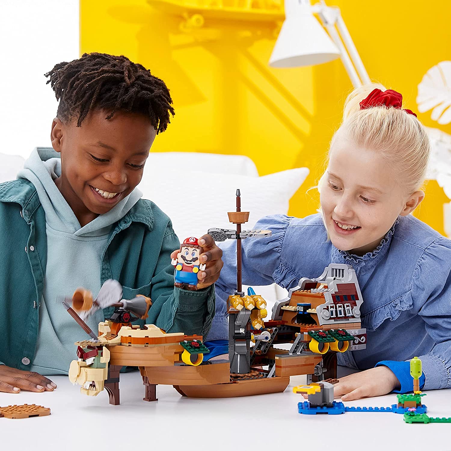 Kamek, Rocky Wrench, and Goomba figures enhance LEGO Super Mario collection.