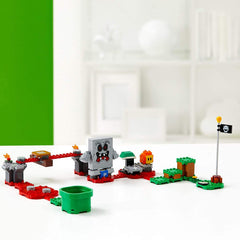 LEGO Super Mario Whomp’s Lava Trouble kid playing with the set