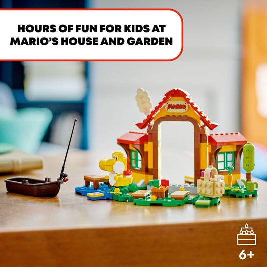 LEGO Super Mario Yellow Yoshi figure greets interactive LEGO Mario figures.