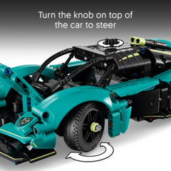 LEGO Technic Aston Martin Valkyrie teal gullwing doors open with realistic motion.