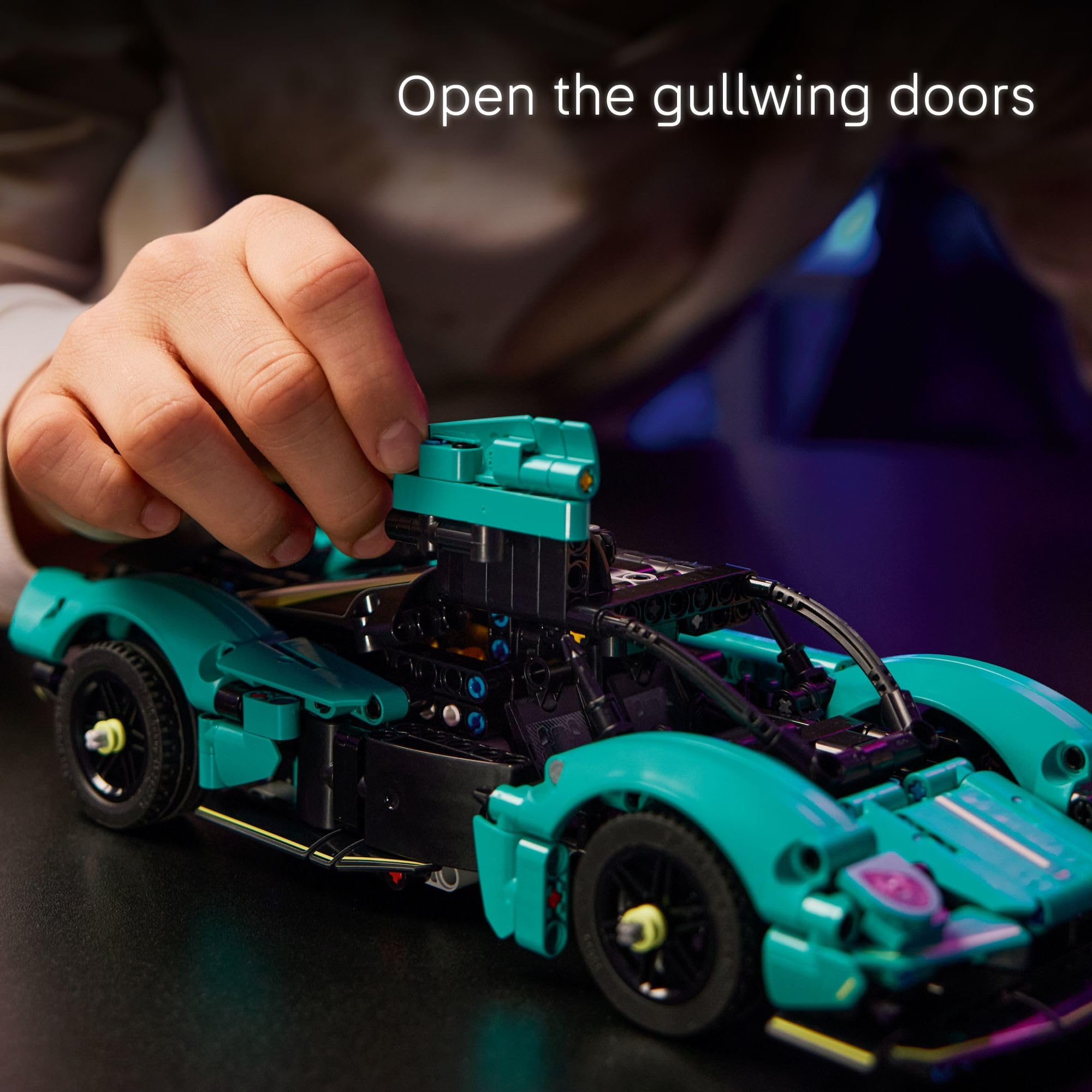 LEGO Technic Aston Martin Valkyrie teal interior detail for immersive pretend play.