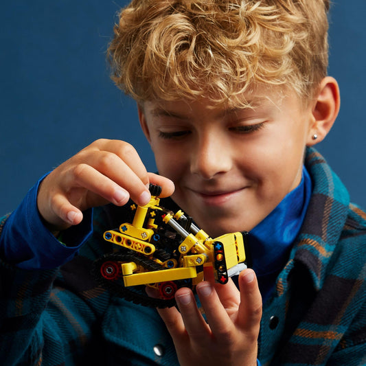LEGO Technic bulldozer tracks enable smooth movement on pretend job sites.
