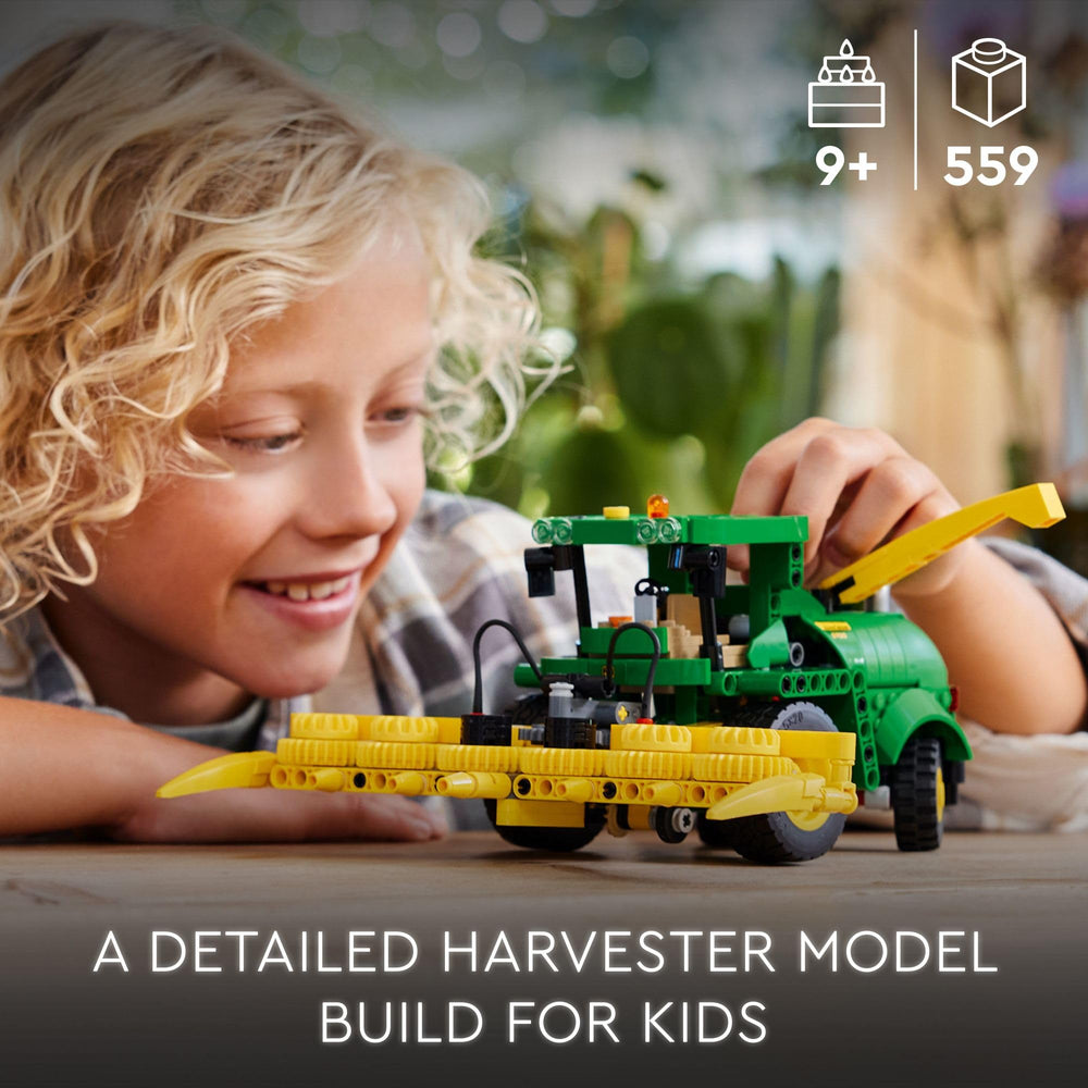 LEGO John Deere 9700 header movement shows raise, lower, and spin for authentic operation.