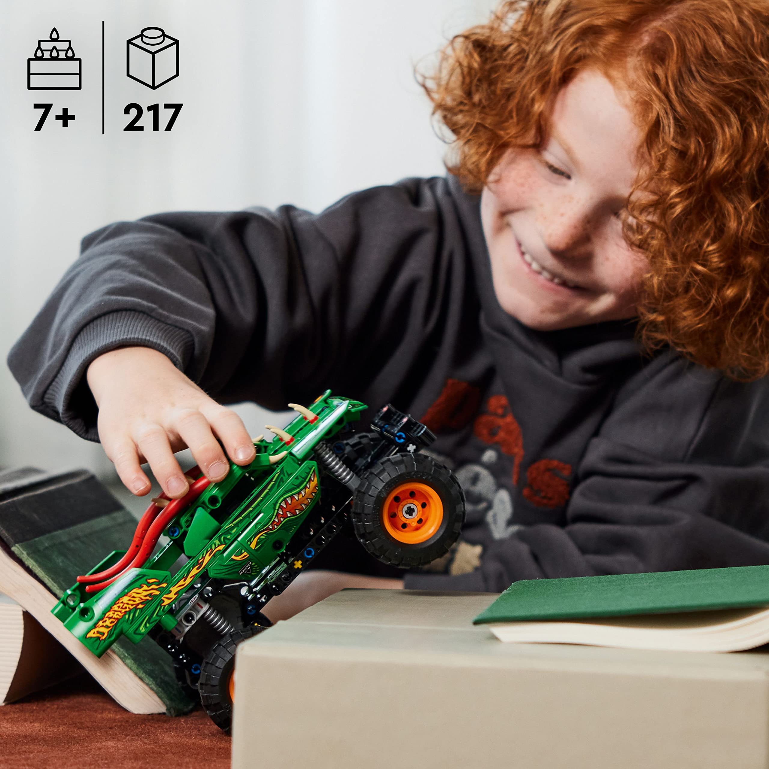 LEGO Technic Monster Jam Dragon Truck with authentic stickers for realism.