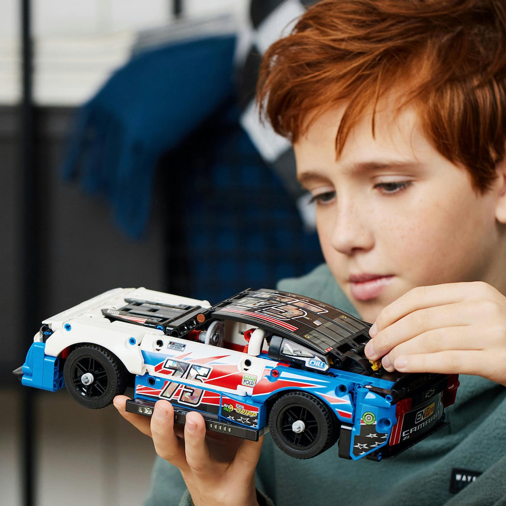 LEGO Technic NASCAR Camaro ZL1 model packaging ready for gifting.