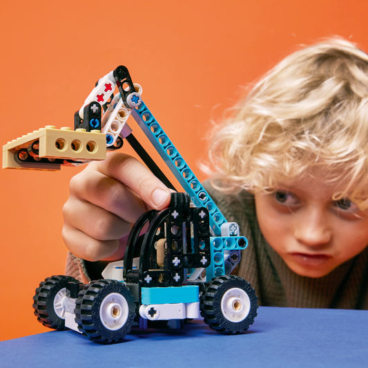 LEGO Technic Telehandler 42133 tilting forks enable precise load handling for kids.