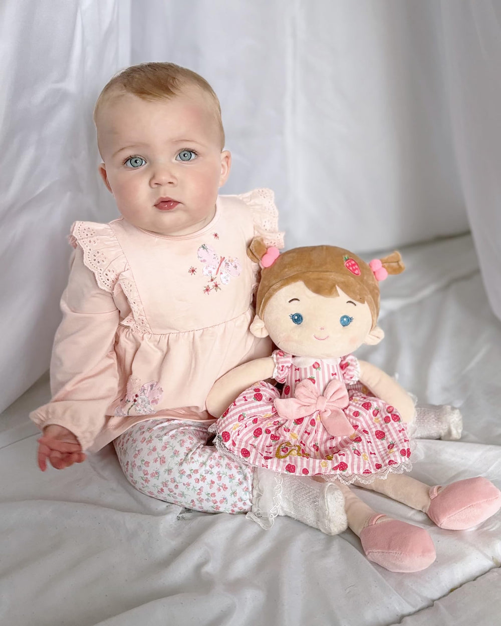 LeyaDoll packaged in pink gift box, ready for gifting.
