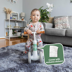 Liberry Baby Balance Bike green being used indoors with toddler