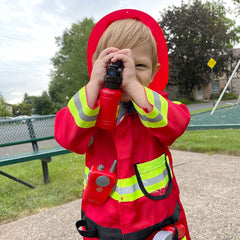 Liberry axe and whistle accessories complete the firefighter toolkit for imaginative adventures.
