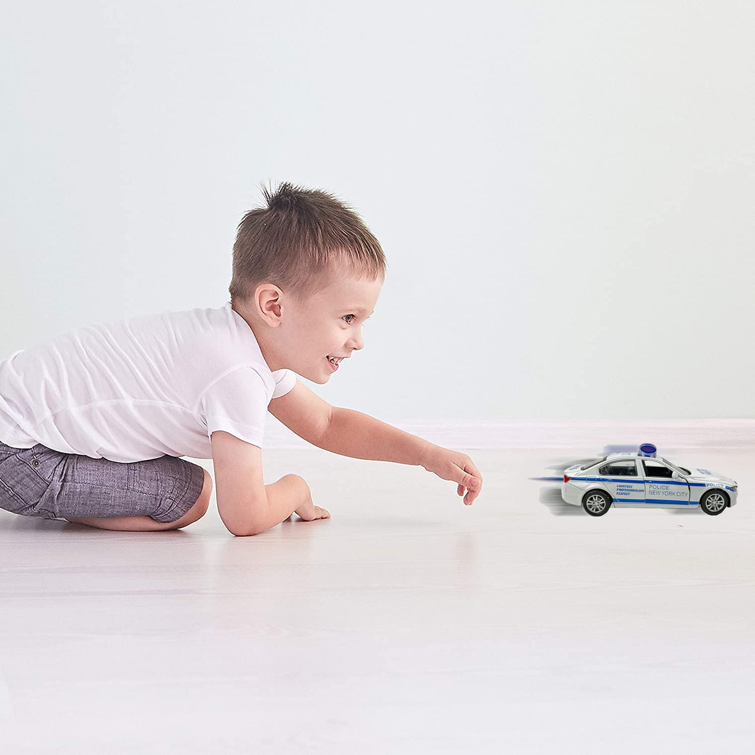 Liberty Imports 1:32 scale NY police car adds authentic size and feel.