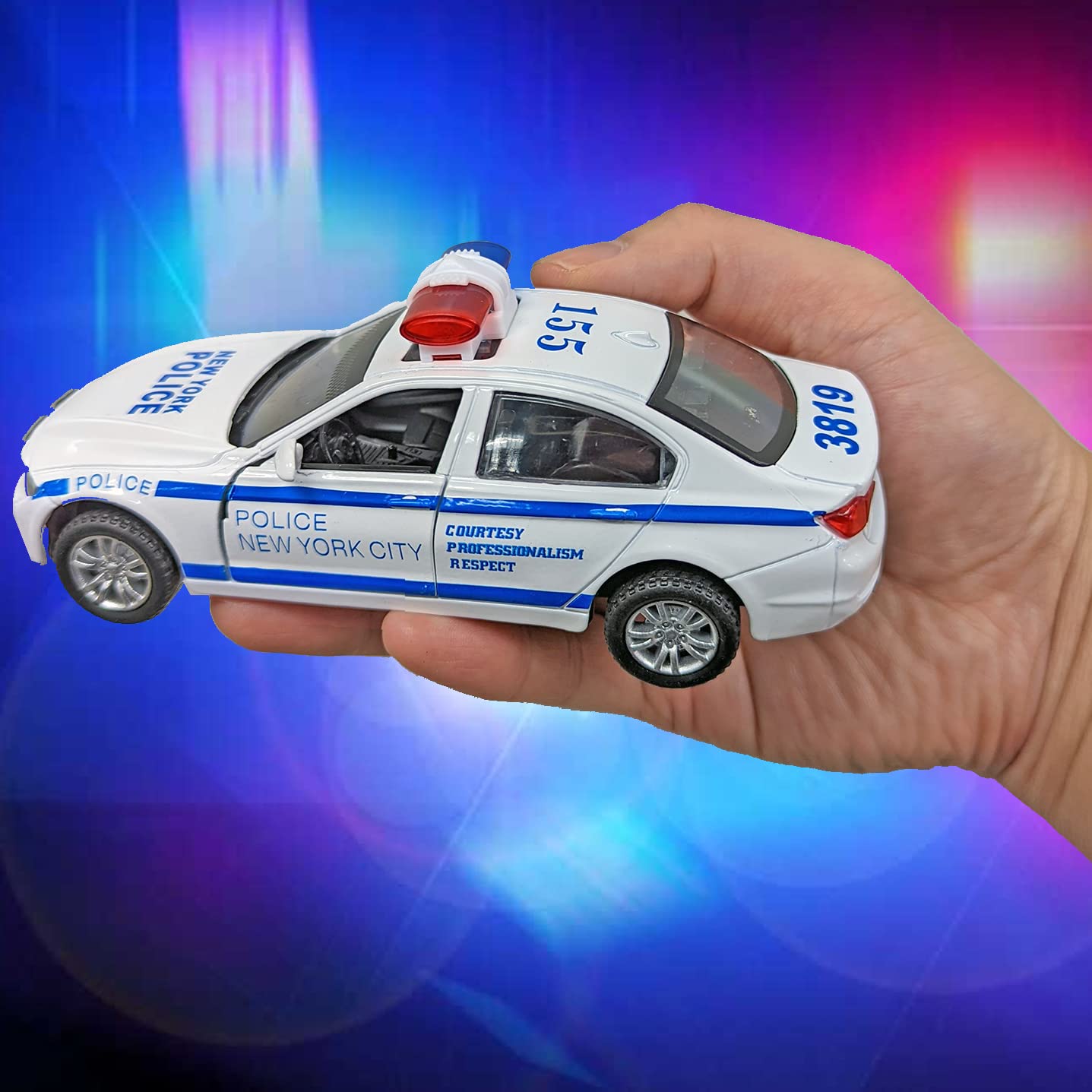 Liberty Imports white-blue police car side view for realistic storytelling.