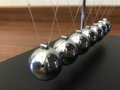 LICRAFT Newton's Cradle offers family fun and learning moments.
