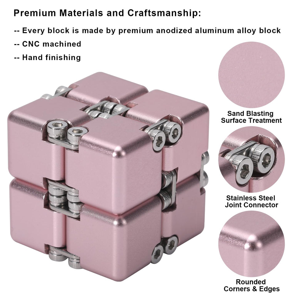 Lifidea Infinity Cube Pink held in hand during focused desk use.