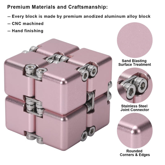 Lifidea Infinity Cube Pink held in hand during focused desk use.