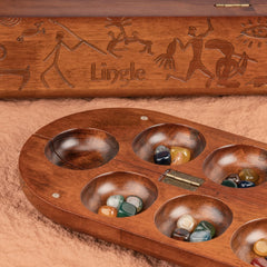 Gift-ready packaging for the Lingle Deluxe Mancala Set.