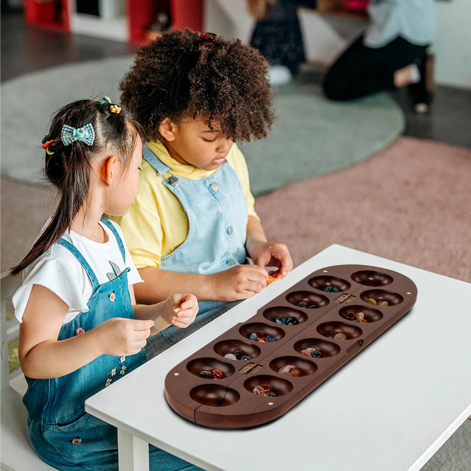 Travel-ready Mancala setup, perfect for on-the-go gaming with friends.