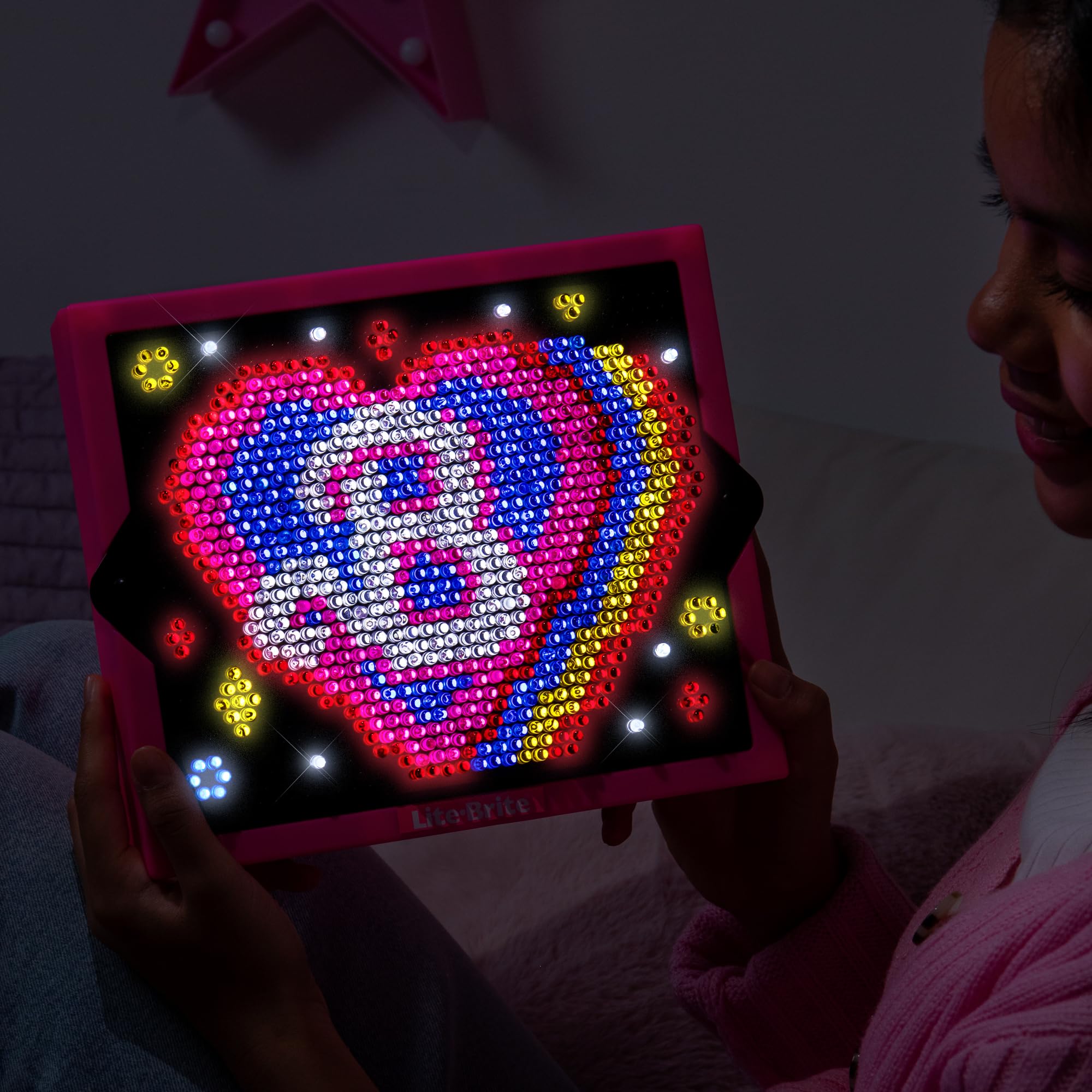 Lite Brite Barbie Edition features four light modes for versatile display effects.
