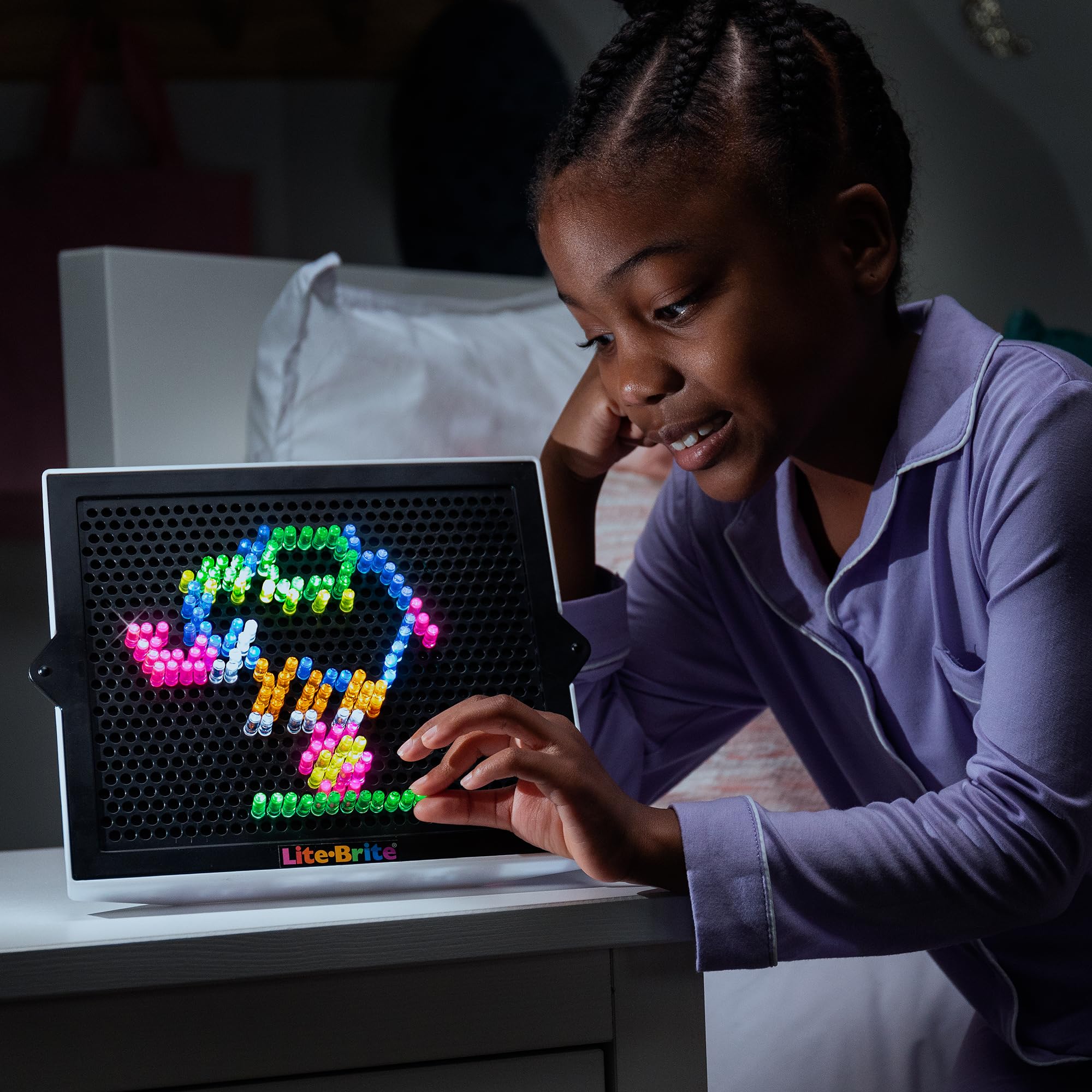 Lite-Brite Classic six design templates offering quick inspiration for art.