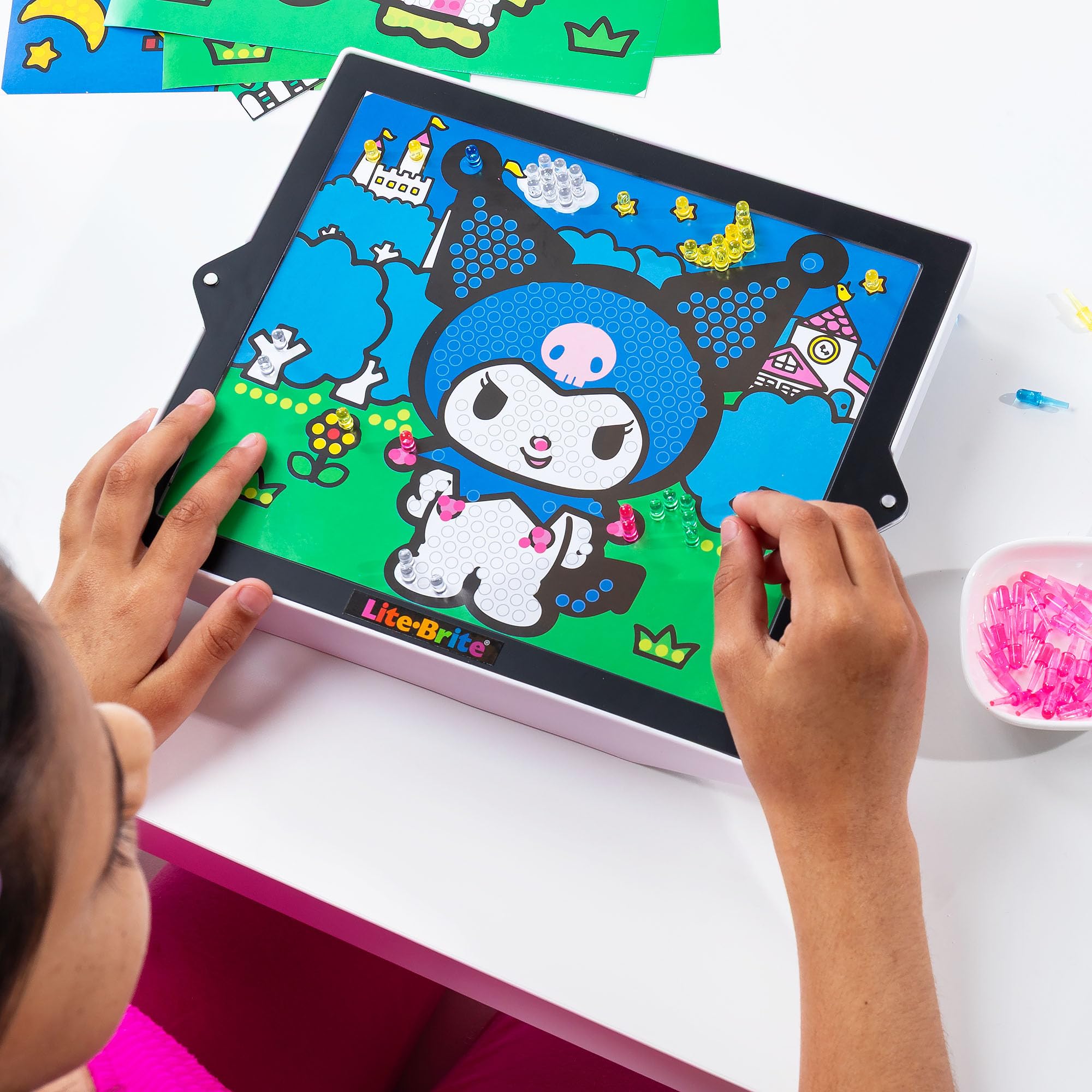 Lite-Brite ColorPOP Hello Kitty pull out easel makes finished glow art easy to display.
