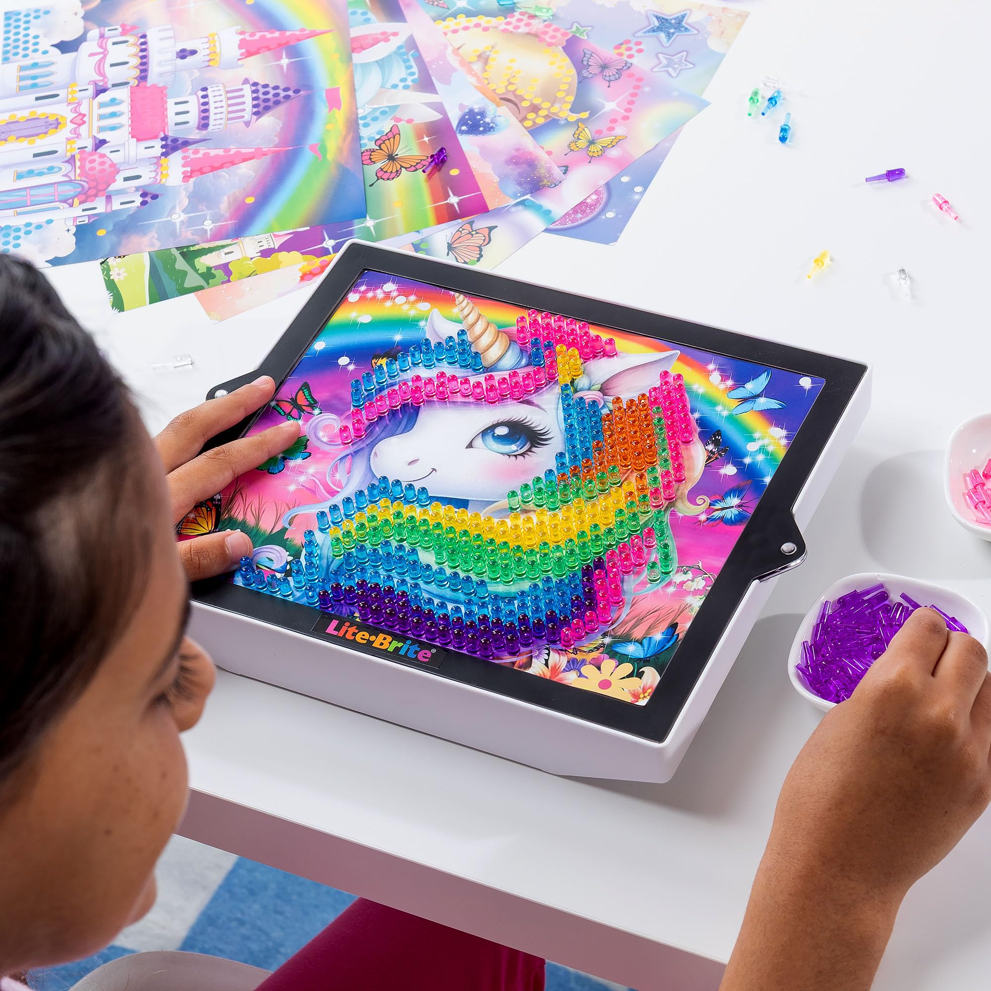 Lite-Brite ColorPOP Twinkle Palace template shines over a glowing royal scene
