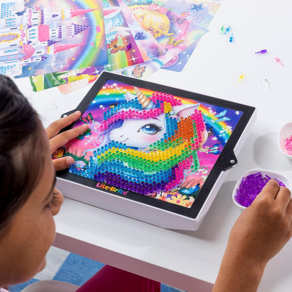 Lite-Brite ColorPOP Twinkle Palace template shines over a glowing royal scene