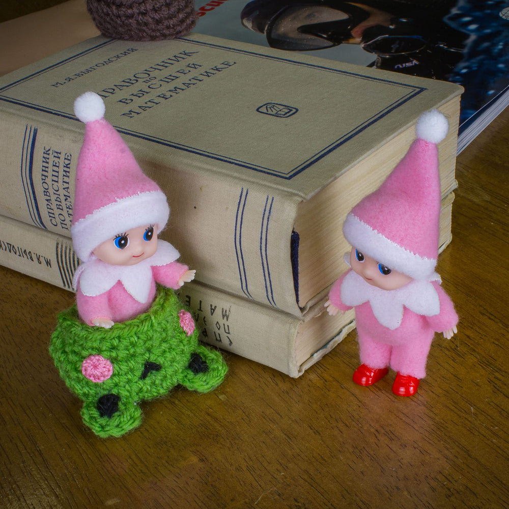 Gift-ready packaging option with a cheerful pink jumpsuit look.