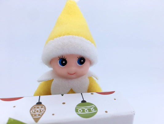LitoMagic baby elf doll yellow jumpsuit, side view, ideal for advent calendar activities