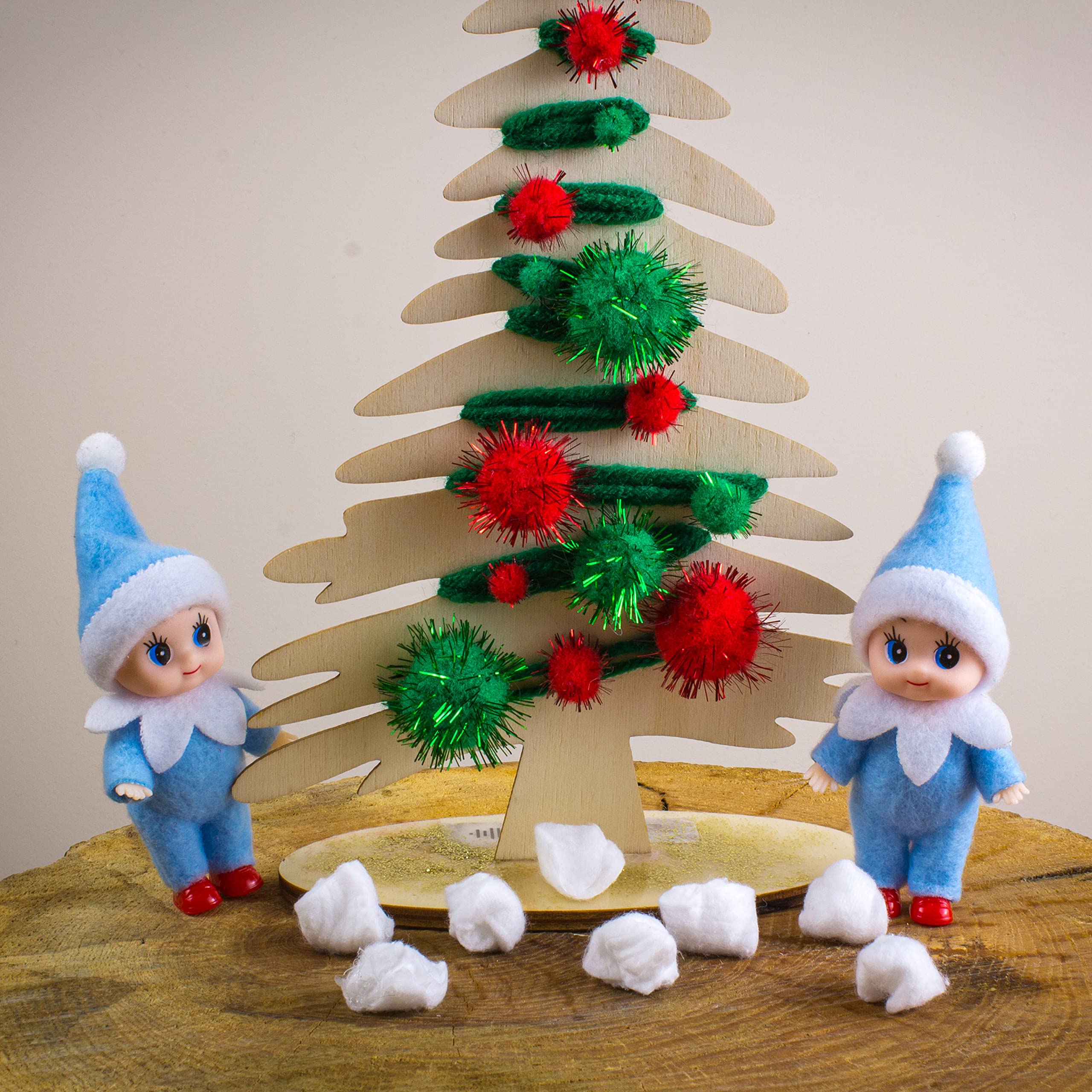 LitoMagic packaging highlights the 4-inch blue jumpsuit elf doll.