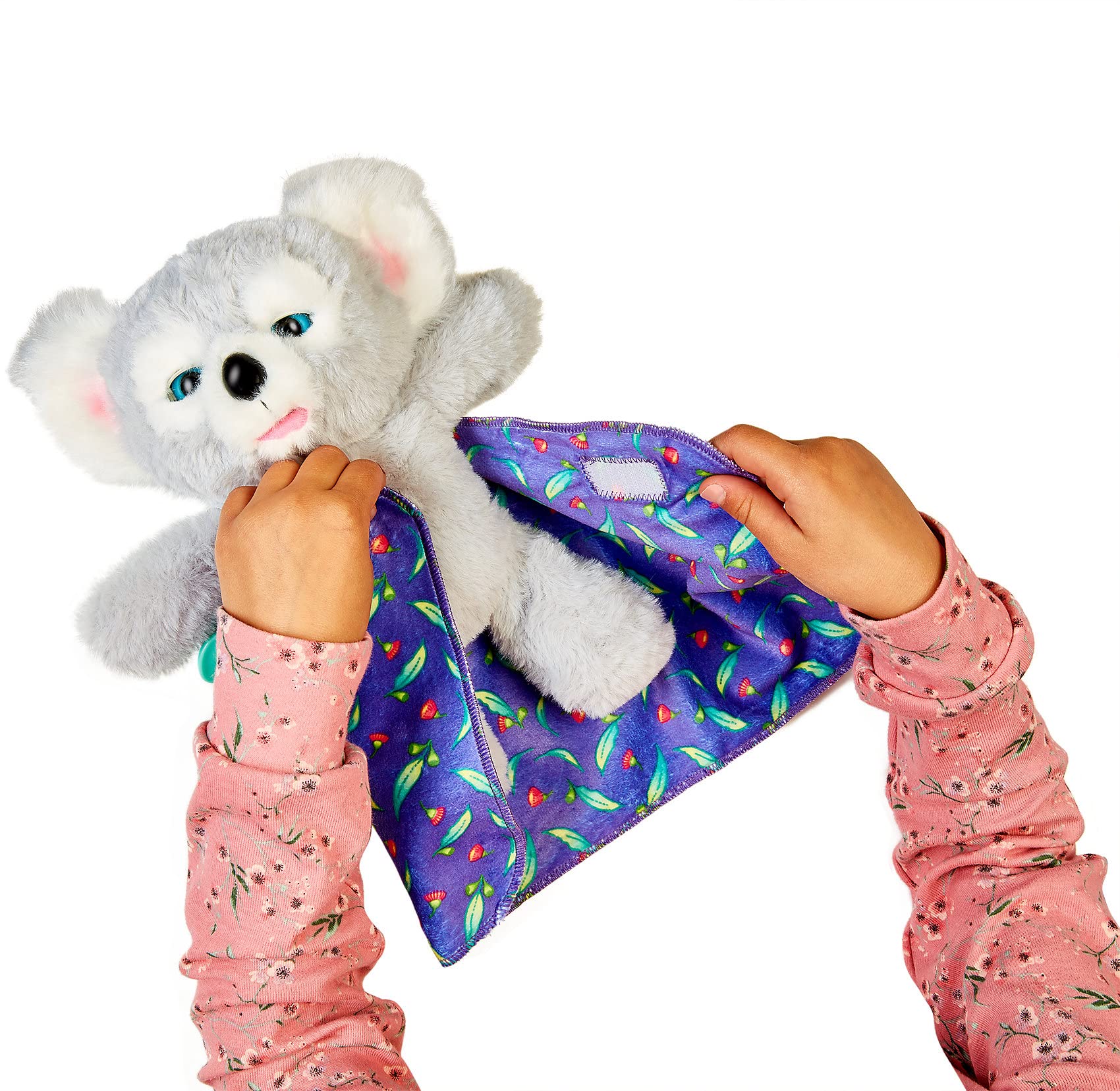 Little Live Pets Cozy Dozy Kip Koala in a bedtime scene with blanket for comfort.