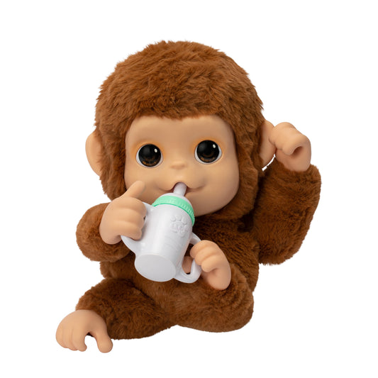 Little Live Pets Mango bottle feeding action supports nurturing play.