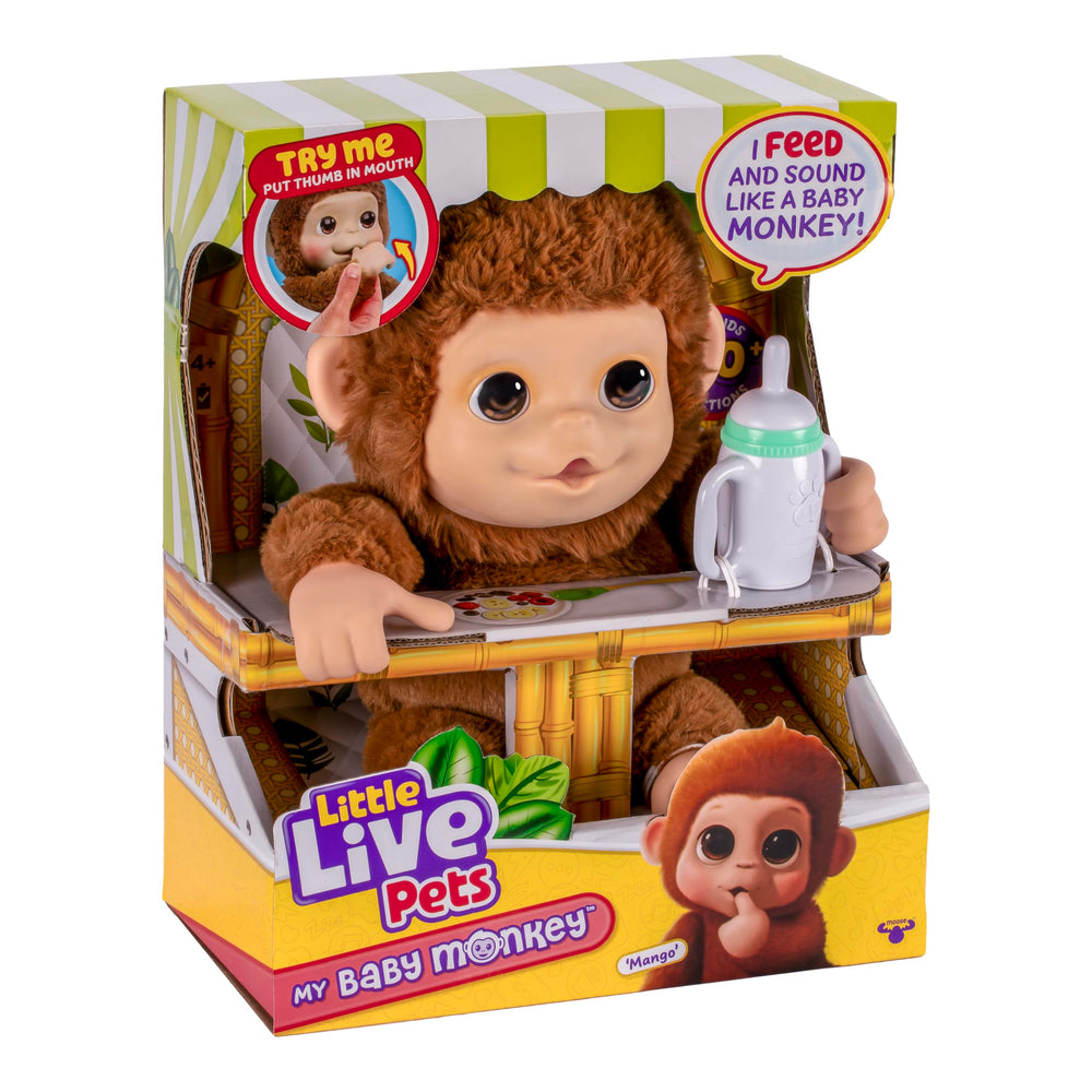 Little Live Pets Mango hanging and playing with toys.