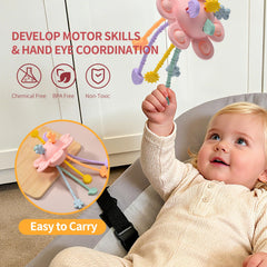 Little Rawr Montessori toy with textured ropes to boost grasping and hand-eye coordination.