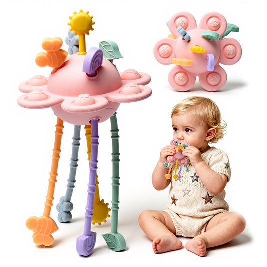 Little Rawr silicone sensory toy with pull strings for engaging tactile exploration and fine motor practice.