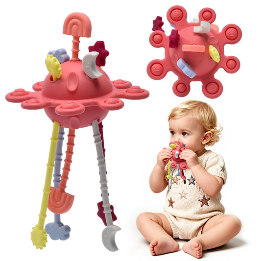Little Rawr pull-string silicone sensory toy enhances fine motor exploration for babies.