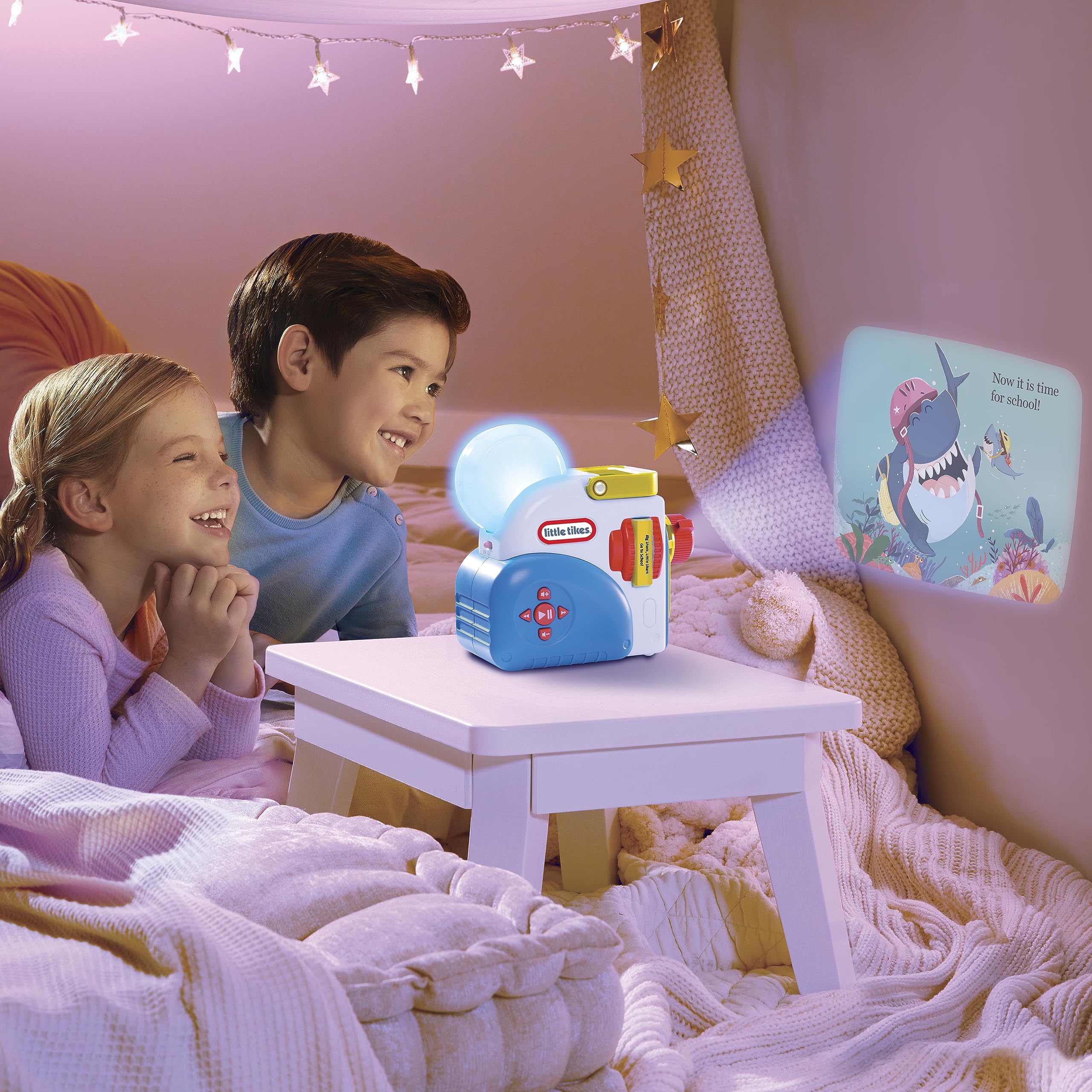 Little Tikes Story Dream Machine Little Shark story illustration engages children with reading.