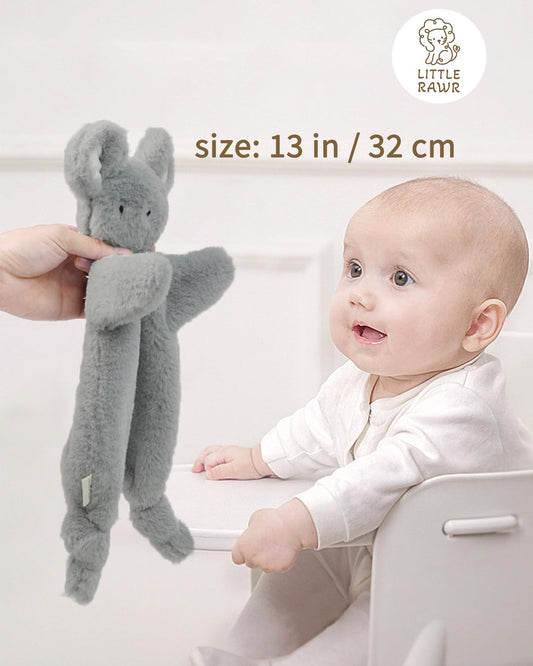 Little Rawr Lovey bunny head with bell detail for sensory engagement.