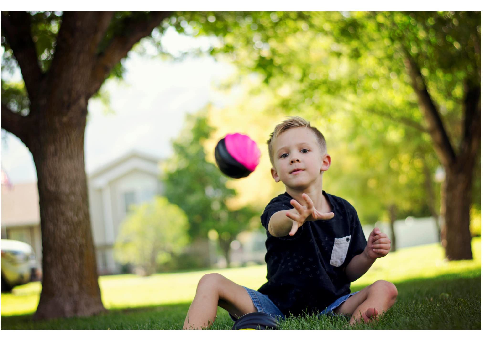 LMC Products three-pack mini footballs on display for party favors.