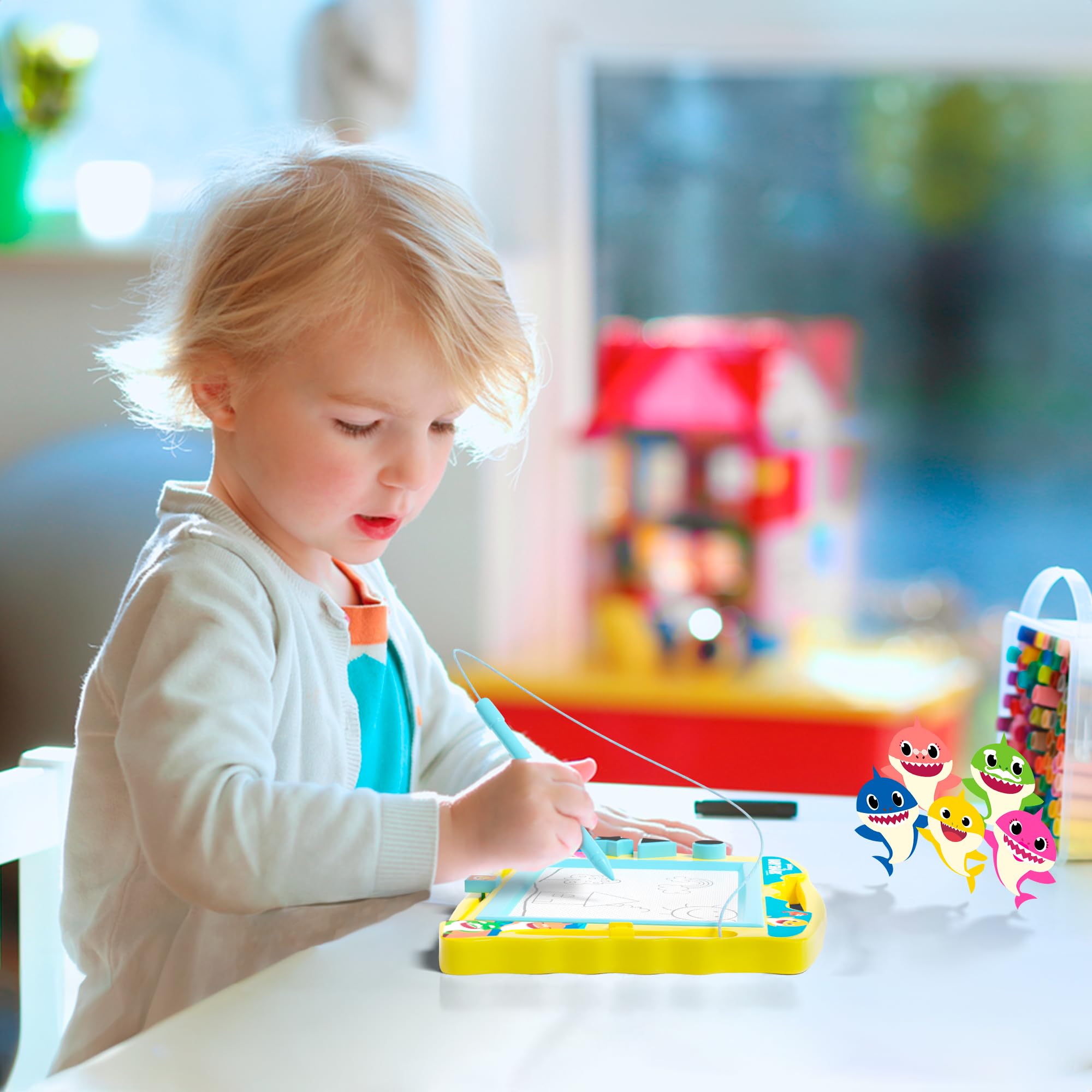 Child uses the Lollipop Baby Shark board for imaginative play