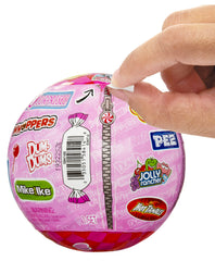 Sticker and two accessories from L.O.L. Surprise Mini Sweets complete the look