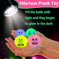 Lomkiwe slime ball glow on dark surfaces with a funny face.