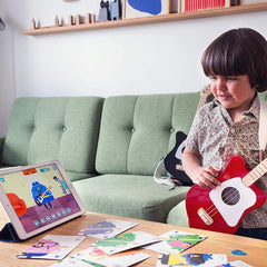 Loog Mini beginners-friendly design boosts early confidence.