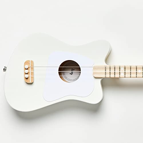 Loog Mini wood grain close-up emphasizes natural tone and build quality.