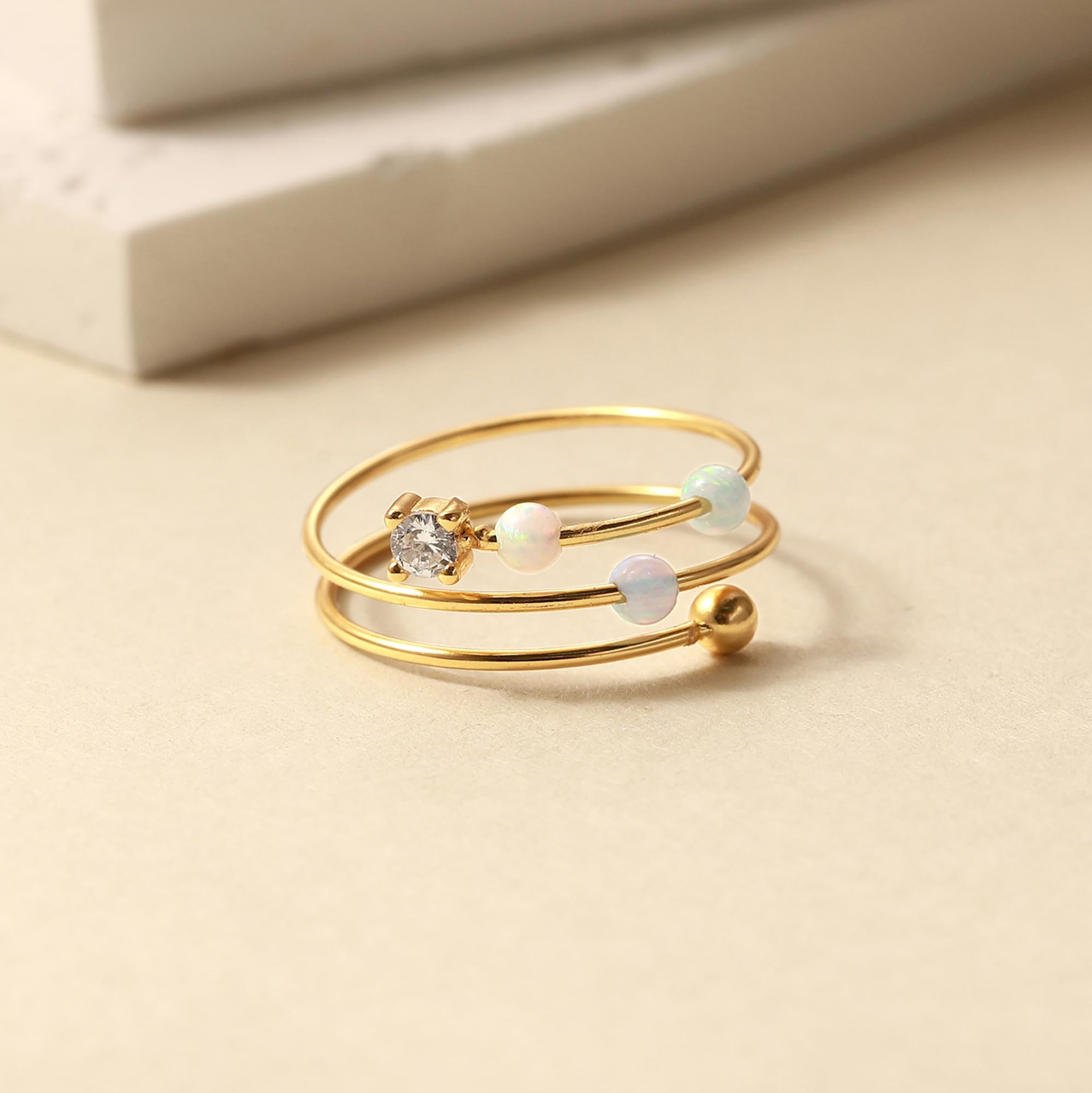 LOVECOM ready-to-gift packaging featuring the opal fidget ring.