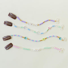 Loveté Hair Charm Kit strings and supplies arranged for easy bead crafting sessions
