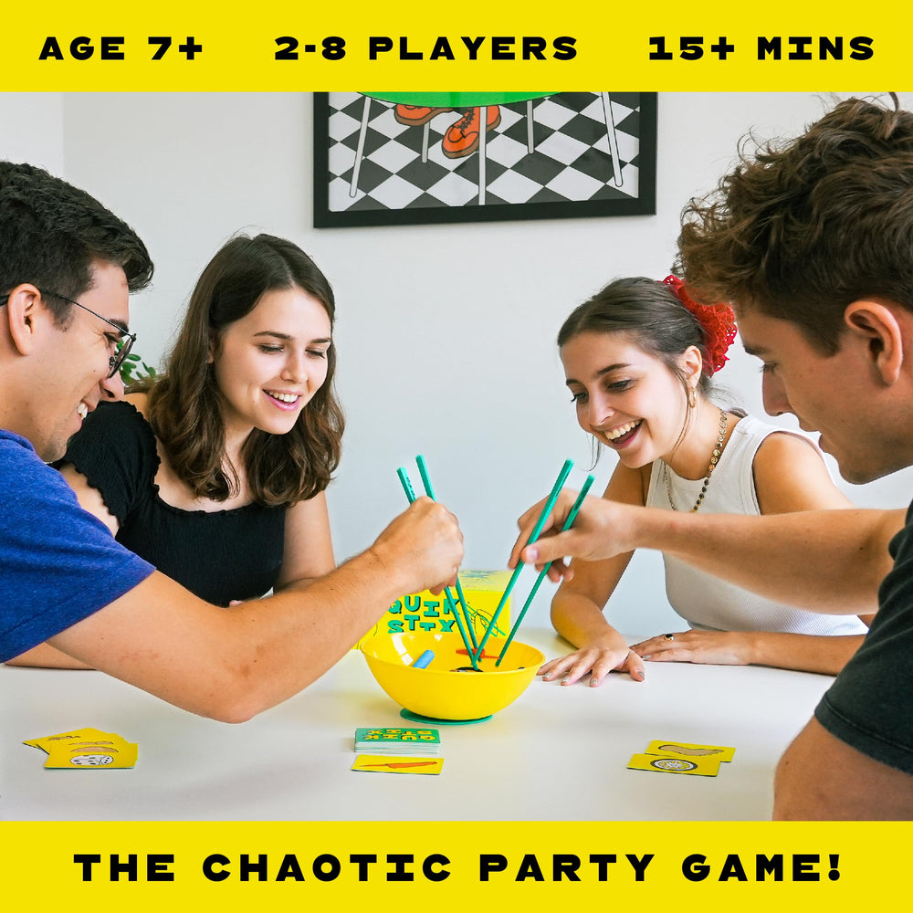 Lucky Egg Quik Stix players compete with chopsticks for dexterity
