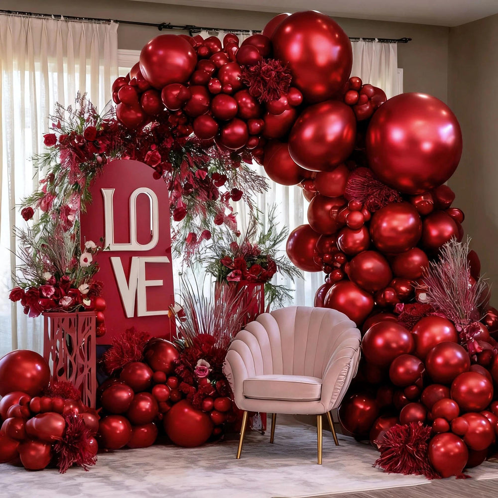 LUXURparty Burgundy double-stuffed 12in balloons add depth to your balloon arch.