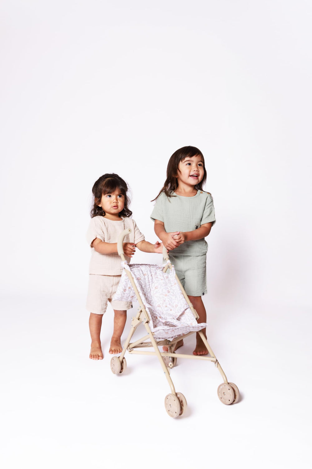 Lyla & Sage 22in beige stroller enhances imaginative doll play.