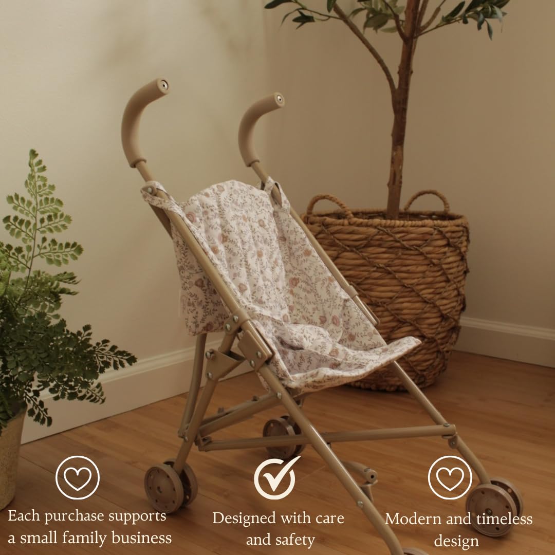 Lyla & Sage doll stroller's beige floral seat supports comfortable, adjustable playtime.