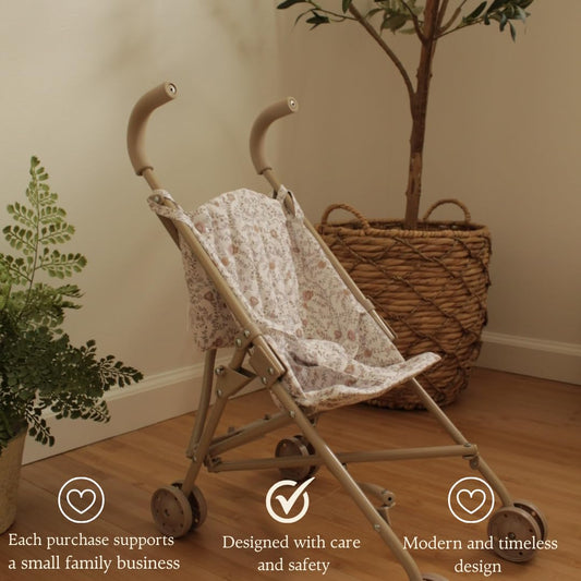 Lyla & Sage doll stroller's beige floral seat supports comfortable, adjustable playtime.