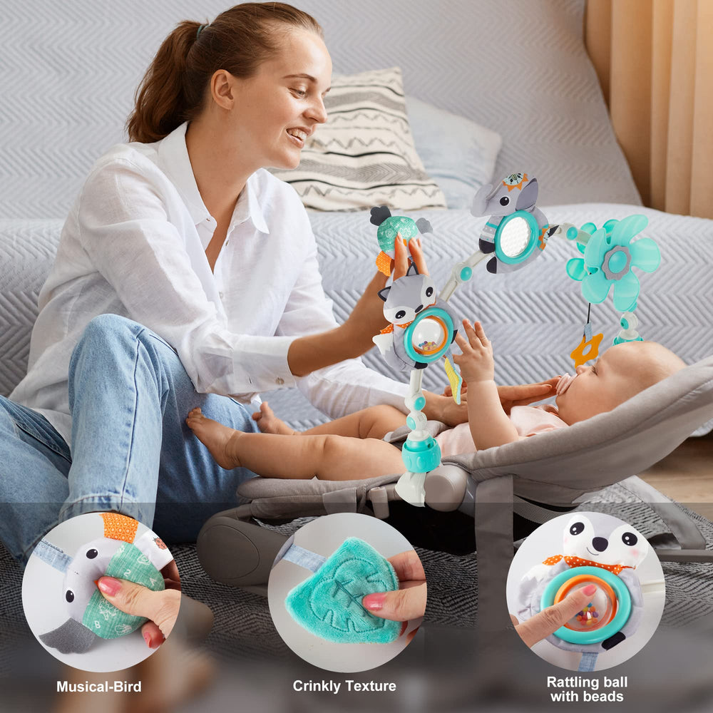 Lynncare arch flower spinner encouraging reach and tracking in baby play.